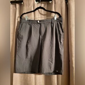 Adidas Men's Charcoal Flat Front Shorts size 33
Inseam 10